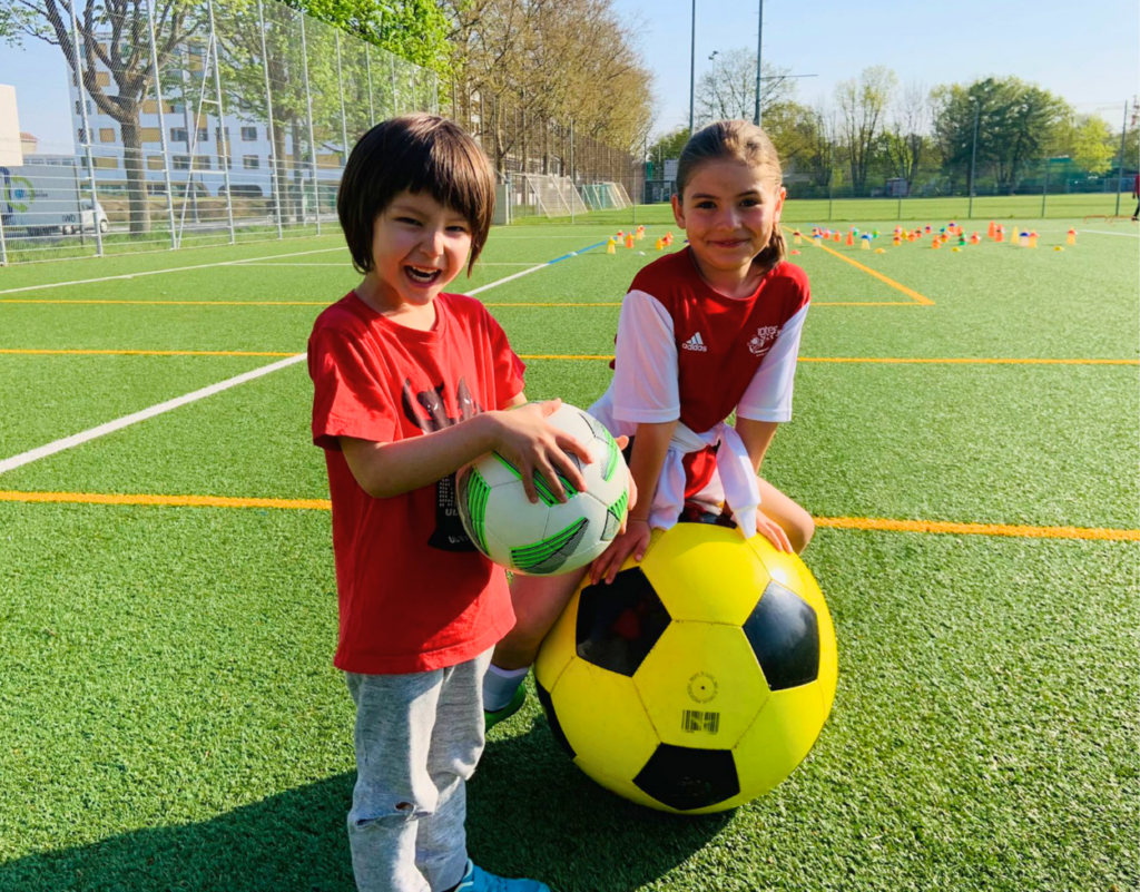 Boys and girls enjoying football at an InterSoccer autumn course