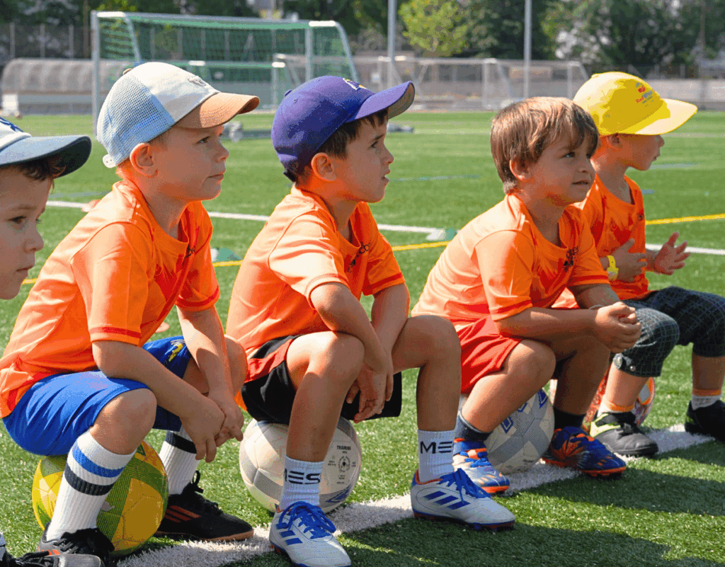 Young children taking part in an InterSoccer Geneva Summer Camp