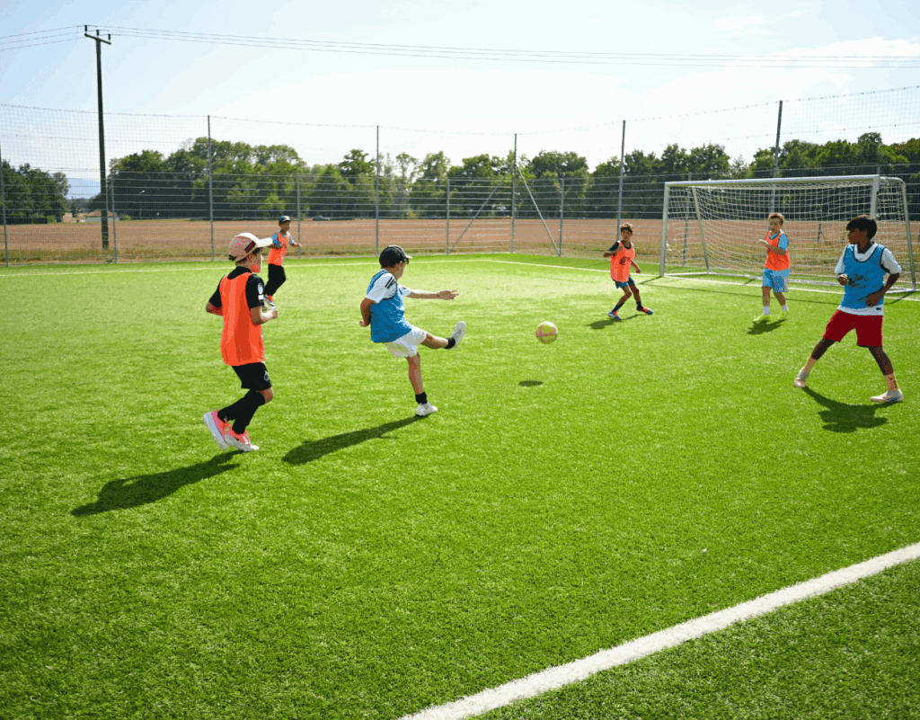 Children enjoying outdoor football activities at InterSoccer Autumn Holiday Camps