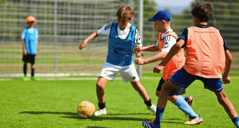 Children developing their football skills at InterSoccer Autumn Holiday Camps