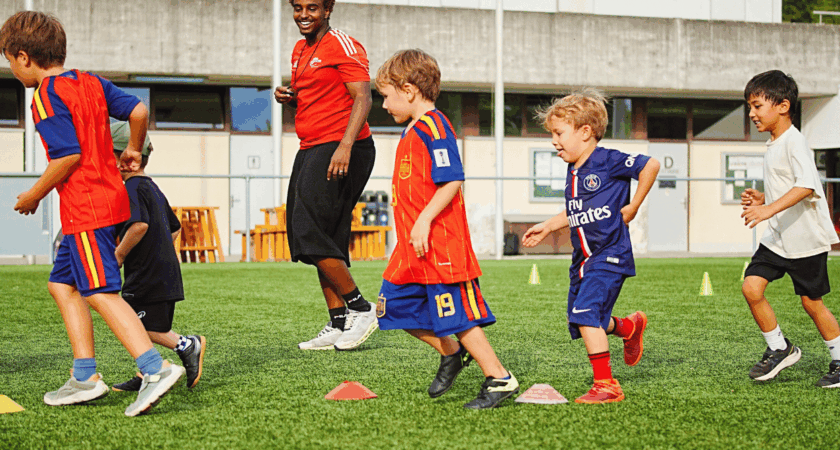 Children running during an InterSoccer football course