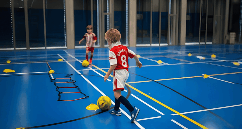 Children playing football at InterSoccer Winter Course